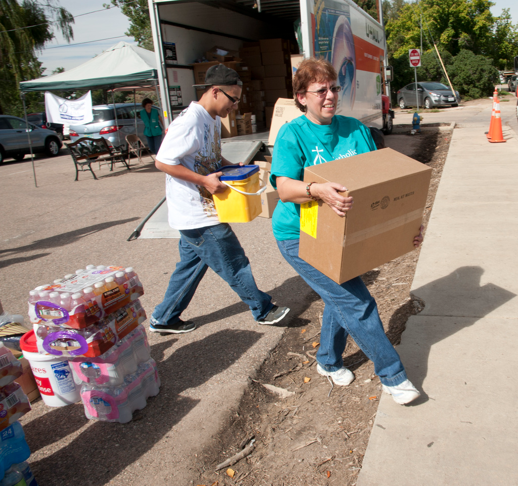 Volunteer member in Colorado helping deliver resources in 2013.