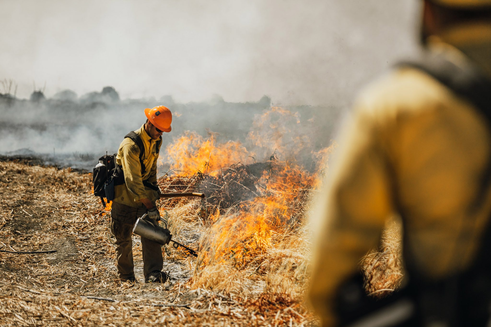 Crews conduct controlled burns at the Edwards Air Force Base in California.