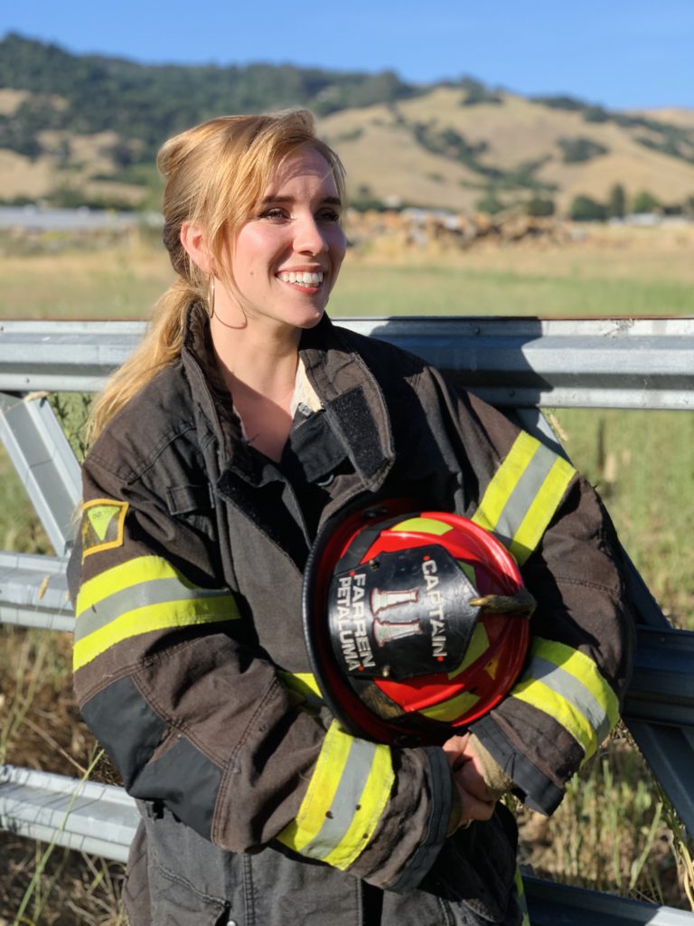 Perimeter CEO Bailey Farren wears a firefighting uniform.