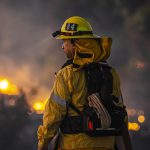 A firefighter overlooks a the brush fire at Sepulveda Basin.